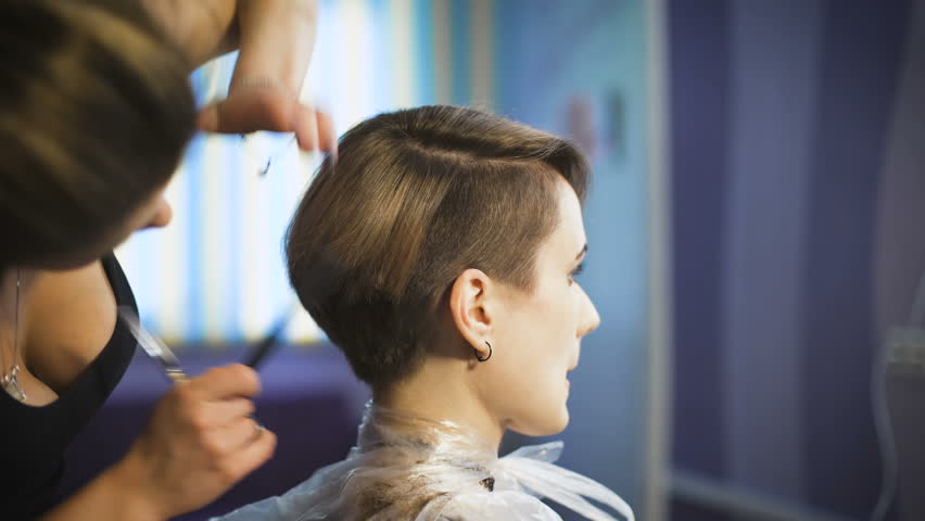 Female Hands Of Barber  Comb And Cut  Hair Of Boy In 