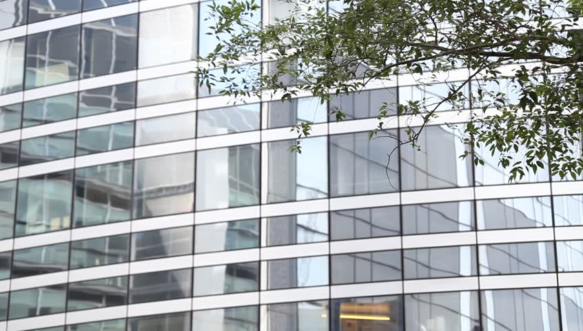 Modern Architecture Glass glass office building and green trees. modern architecture design Modern Architecture Glass glass office building and green trees. modern architecture design