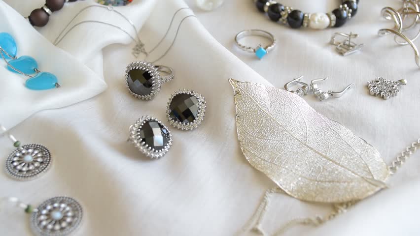 Bead Earrings Stock Video Footage 4k And Hd Clips Shutterstock Hd00 26jewelry Rings Bracelets And Earrings At Silk Background Stylish Composition Of Various Jewelry On A Beautiful