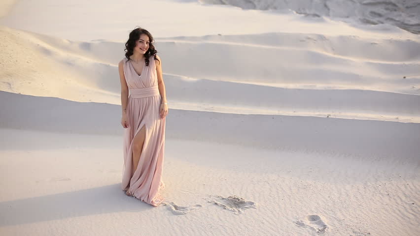 Girl in a white dress walking on the beach images Girl in a white dress walking on the beach images
