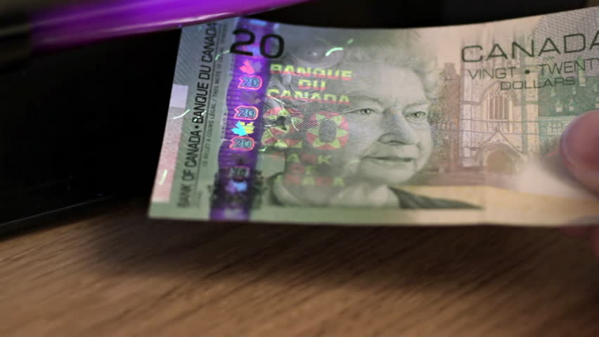 Canadian Dollars Under Uv Light Stock Footage Video 100 Royalty Canadian Dollars Under Uv Light