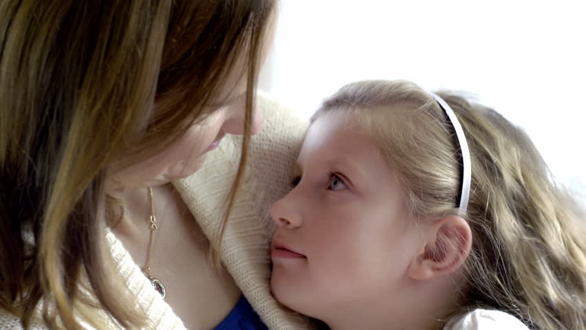 Beautiful Cute White Caucasian Brown Hair Green Eye Red Close Up Of A Strong Contact Between Little Girl And Loving Mother Mom