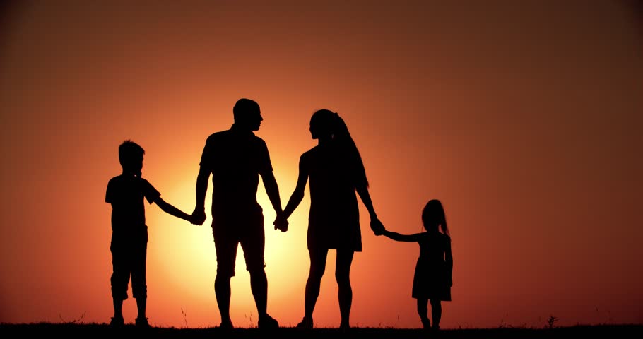 Silhouette Of Two Children, A Brother And Sister Walking Holding Hands ...