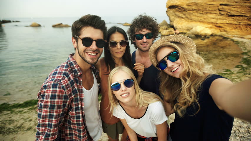 young-man-in-sunglasses-with-a-camera image - Free stock ...