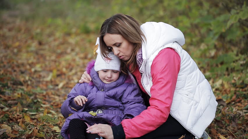 Hd00 31the Little Girl Crying In Autumn Park Mother Comforting A