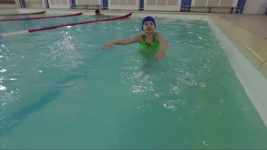 Cool Indoor Pools With Fish small fish swim around man standing in azure sea water stock Cool Indoor Pools With Fish small fish swim around man standing in azure sea water stock