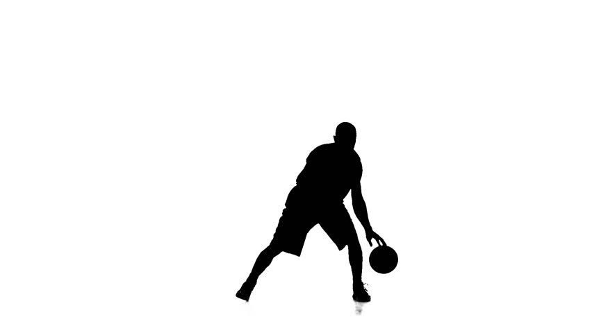 Basketball Player Fills The Ball. Slow Motion. Silhouette. White