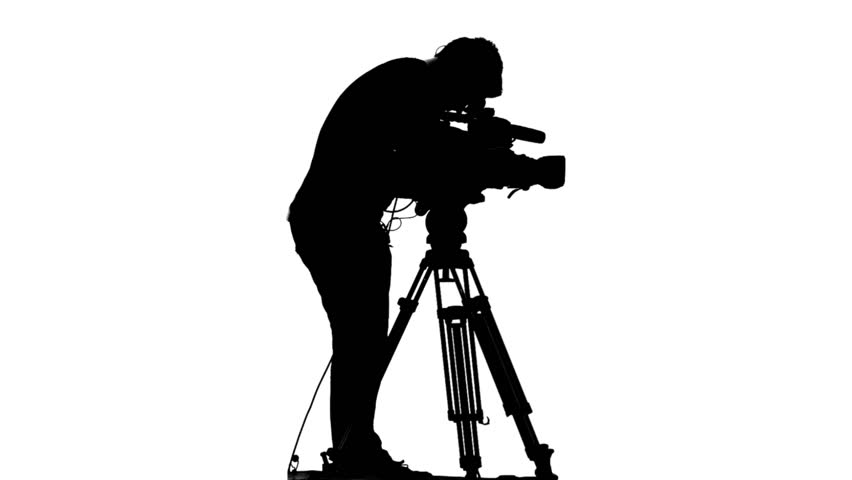 Silhouette Of A Cameraman Recording Digital Video Stock Footage Video ...