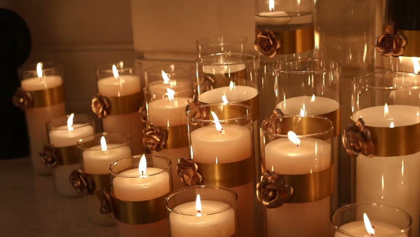 many candles burning decorative candle in a glass candlestick large wax candles are lit - Decorative Candles many candles burning decorative candle in a glass candlestick large wax candles are lit - Decorative Candles