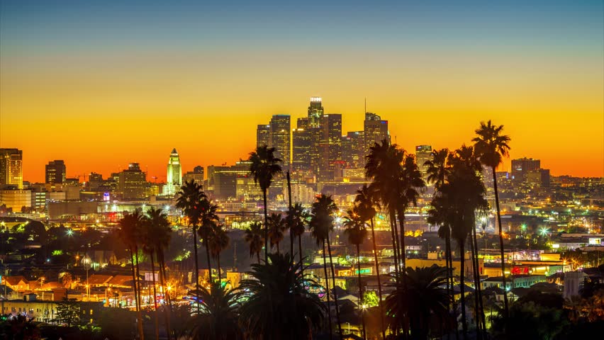 4K. Palm Trees Silhouettes Over Night City Of Los Angeles, California ...