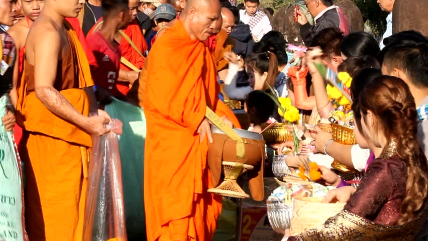 Buddhist Alms Giving Ceremony. Giving Alms To Monks Was The Most ...