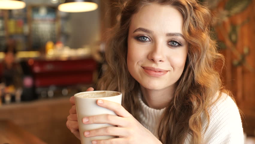 Pretty Girl Looking At Camera And Smiling. Beautiful Woman With Cup Of ...