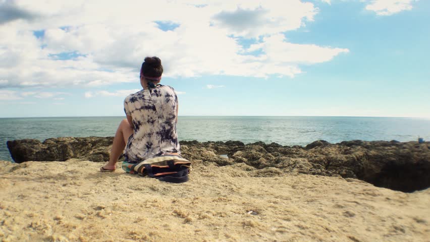 Thoughtful Girl Sitting Alone At Beach Young Woman Looking The Ocean On A High Thoughtful Girl Sitting Alone At Beach Young Woman Looking The Ocean On A High
