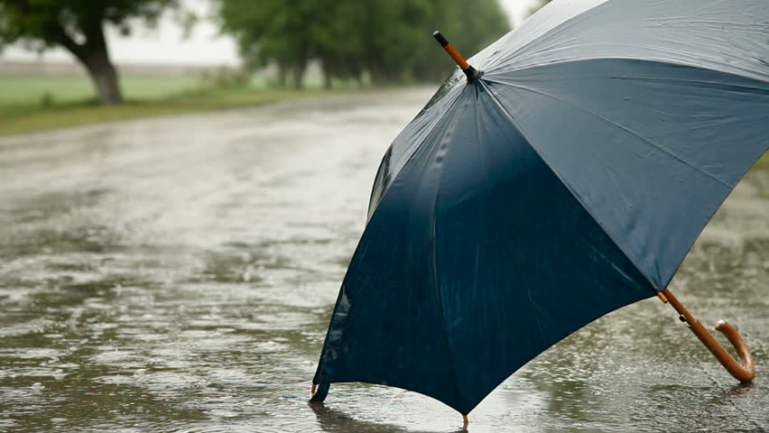 Umbrella On the Road Under Video de stock (totalmente libre de ...