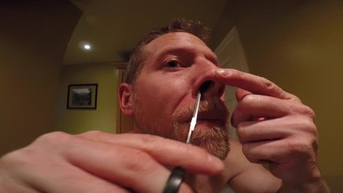 Man Trims His Nose Hair Funny Stock Footage Video (100% Royalty-free) 27546082 | Shutterstock Man Trims His Nose Hair Funny Stock Footage Video (100% Royalty-free) 27546082 | Shutterstock
