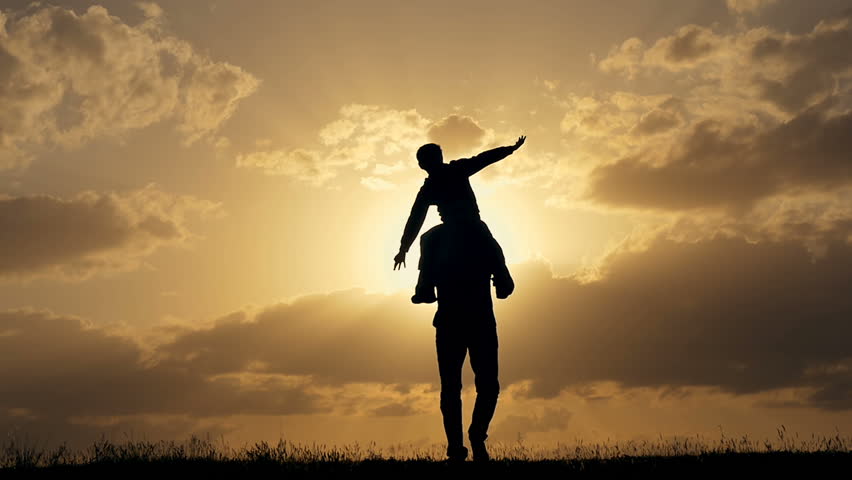 Young Couple Silhouettes Dancing On The Field At Sunset Stock Footage 