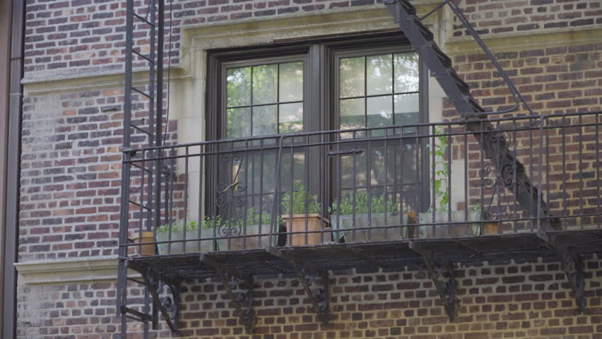 Brick Apartment Building exterior wide establishing shot of a vintage brick office or Brick Apartment Building exterior wide establishing shot of a vintage brick office or