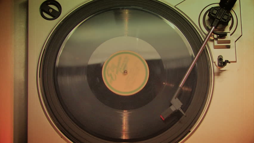 A retro-styled film look of a spinning record player.