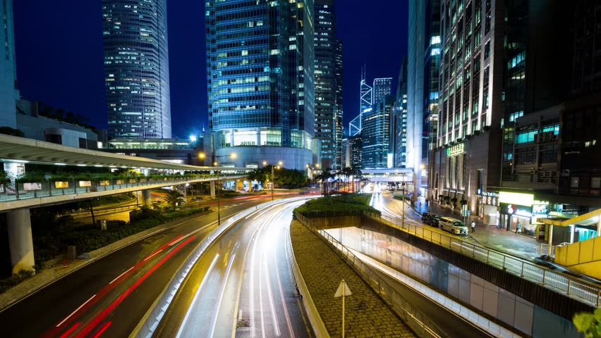 Cityscape Timelapse At Night. Hong Kong. Busy Traffic Across The Main ...