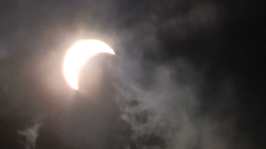 Stock Video Clip of Solar eclipse with eerie ominous black clouds ...