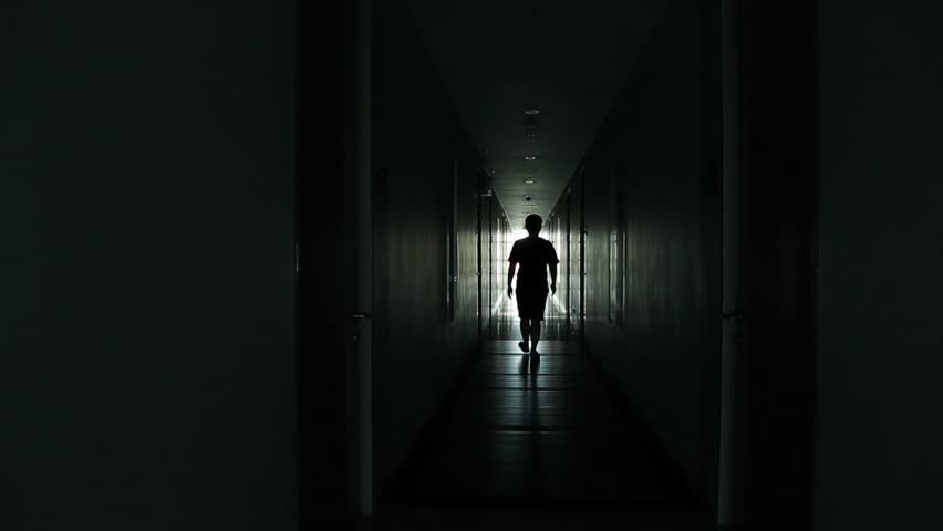 Shot Of Male Inline Walking Along Hostel Corridor, Static Camera Stock ...