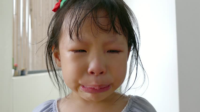 Asian girl cries mommy