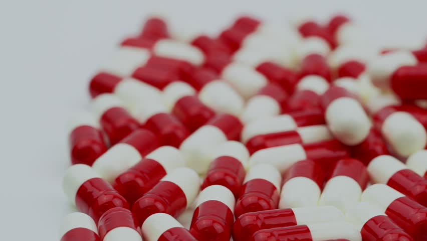 Red And White Antibiotics Capsule Stock Footage Video 100