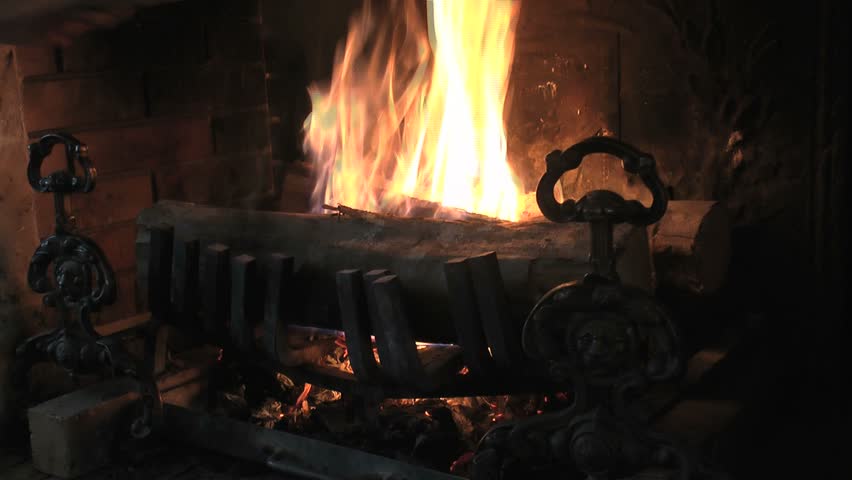 Man Positions Logs In Burning Fireplace 1080p