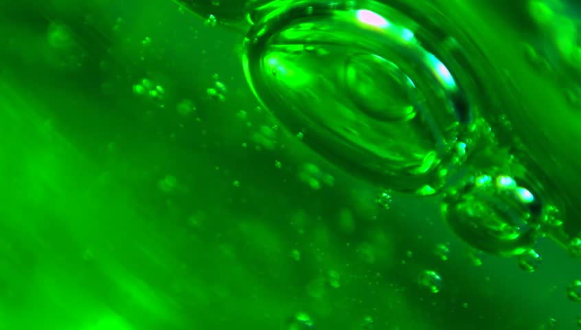 Extreme Macro Of Bubbles In Green Jello Cream (gel). Stock Footage ...