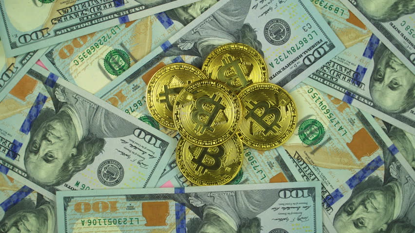 Gold Bit Coin Btc Coins Stock Footage Video 100 Royalty Free Gold Bit Coin Btc Coins Rotating On Bills Of 100 Dollars Worldwide Virtual Internet Cryptocurrency And Digital Payment System Money Crypto