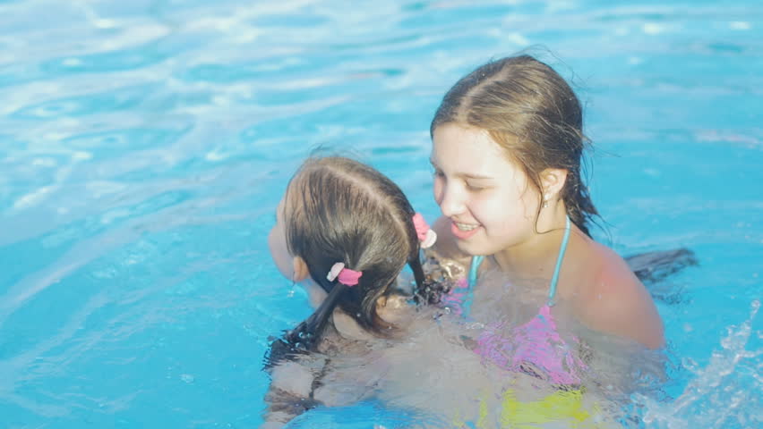 My sister swimming. Swimming Pool Lil sis. Сестра с подругой в бассейне и се. Sisters Bathing Pool. Granddaughter Bath in Pool.