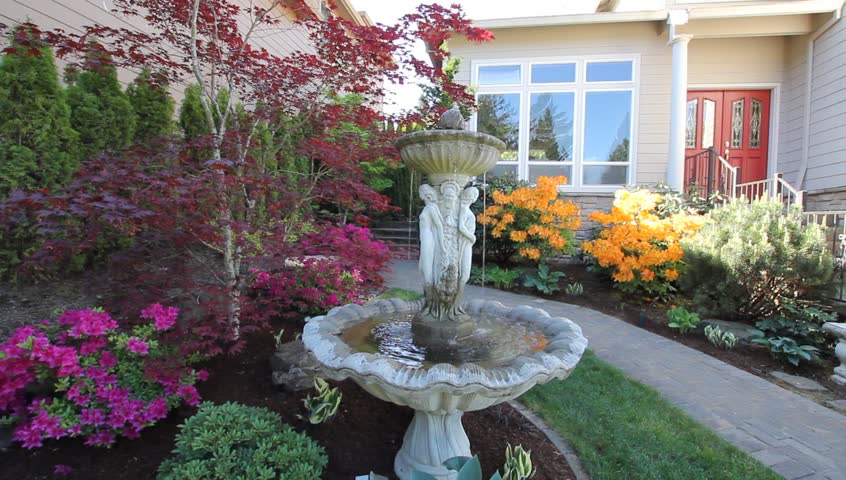 Frontyard Garden With Water Fountain, Flowering Azalea ...