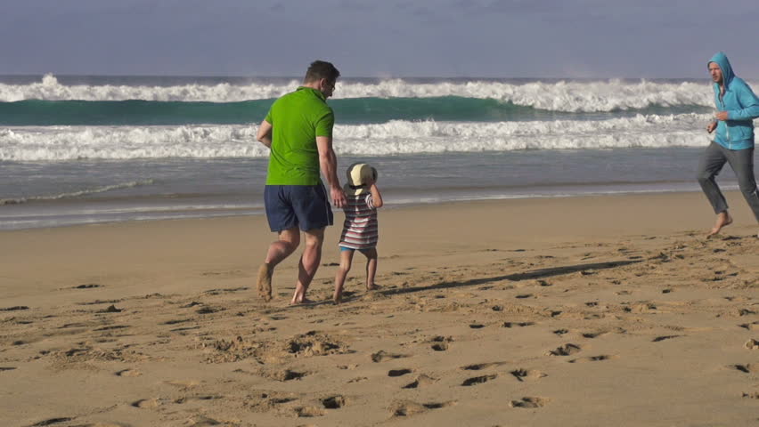 Stock video of father, son and joggers on the | 3912602 | Shutterstock