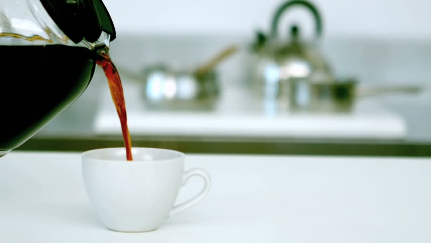 Stock Video Of Black Coffee Being Poured Into Cup Stock Video Of Black Coffee Being Poured Into Cup