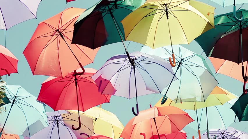 Multicolored Umbrellas Background. Colorful Umbrellas Urban Street