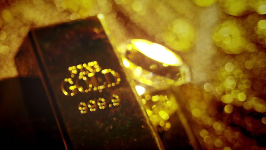 Gold bars, coins and riches. A scene of cluttered treasure and diamonds. Unimaginable wealth.
