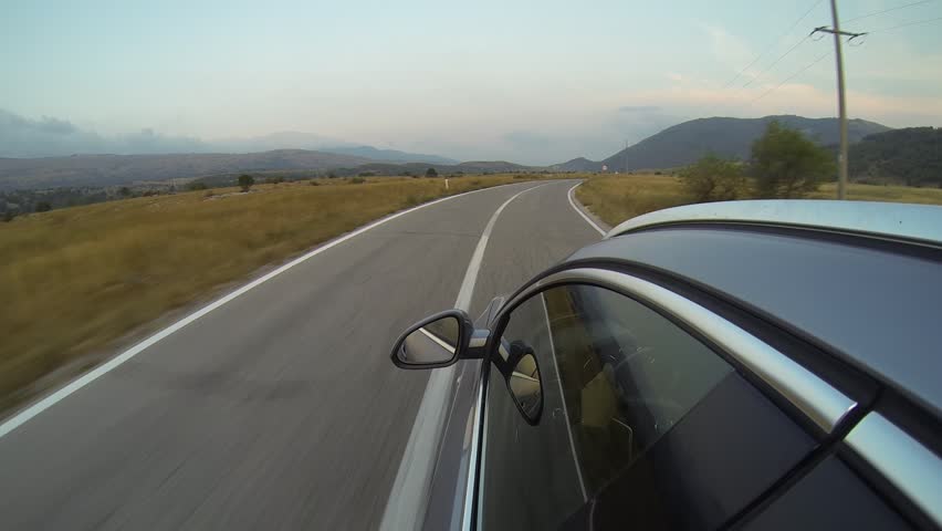 Car Goes On Bilateral Road Among Wood Behind Other Cars Stock Footage ...