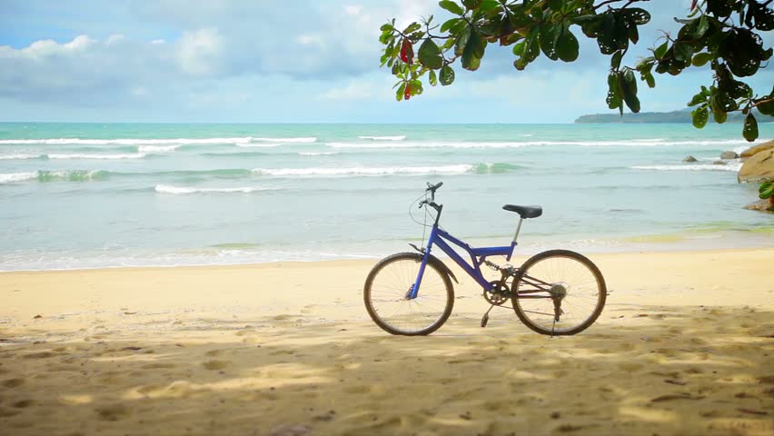Video 1080p Bicycle Parked On A Tropical Beach Stock Footage Video 1080p Bicycle Parked On A Tropical Beach Stock Footage 5012732 Shutterstock