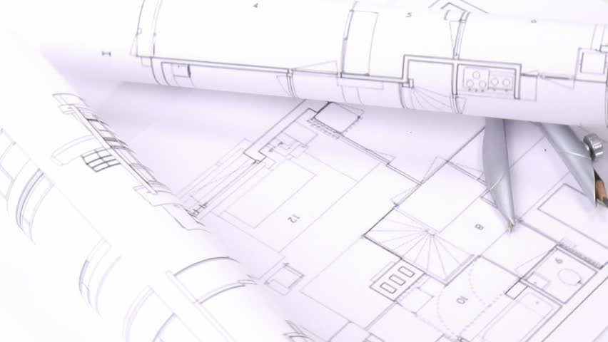 Architectural Drawing Blueprint place on an architectural drawing blueprint a triangle and a pen Architectural Drawing Blueprint place on an architectural drawing blueprint a triangle and a pen