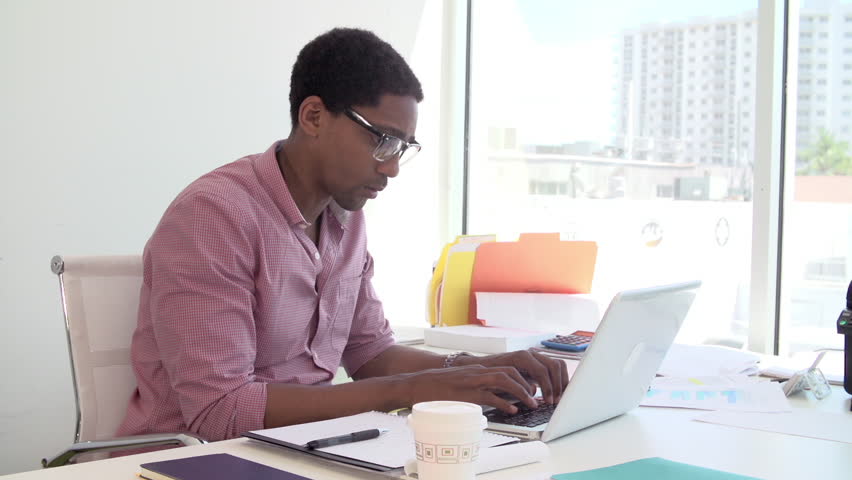 Businessman Working at Desk in Stock Footage Video (100% Royalty ...