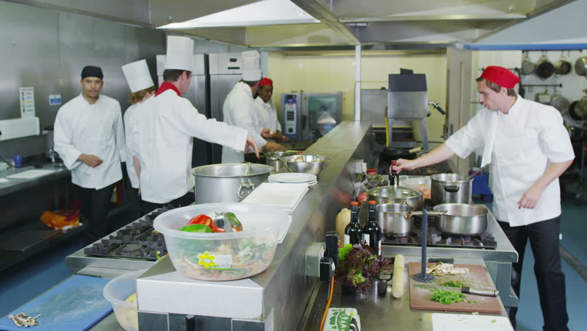 Restaurant Kitchen Video time lapse clip of a busy team of chefs, working hard and Restaurant Kitchen Video time lapse clip of a busy team of chefs, working hard and