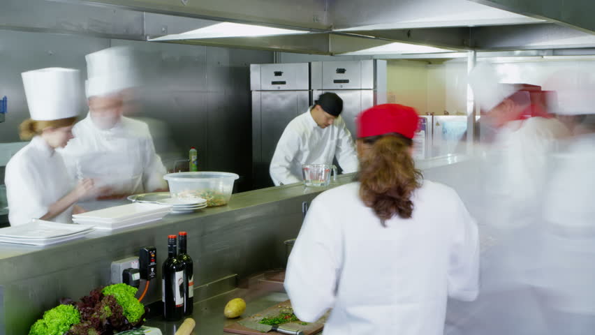 Restaurant Kitchen Video time lapse clip of a busy team of chefs, working hard and Restaurant Kitchen Video time lapse clip of a busy team of chefs, working hard and