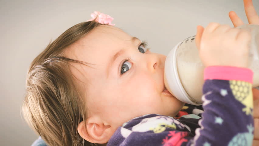 Cute Baby Girl Drinking Milk Stock Footage Video 100 Royalty Free