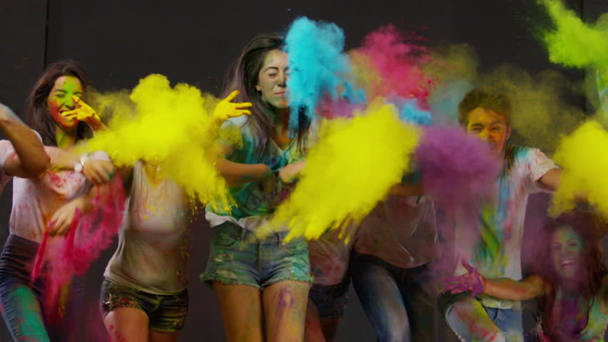 Colorful holi. Beautiful Youth. Holi festival of colorful kicks. Slow Motion. Shot on RED EPIC Cinema Camera 300 fps.