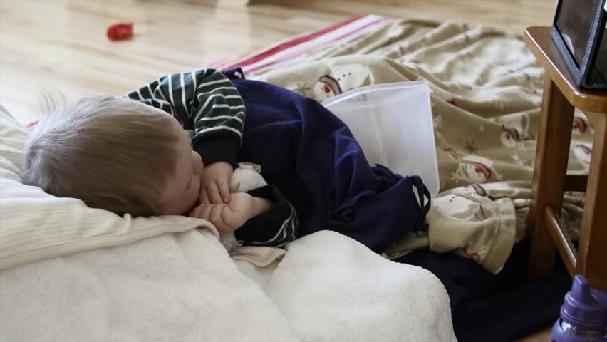 A Little Toddler Boy Lying Stock Footage Video 100 Royalty Free