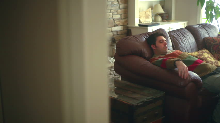 Lazy Man On A Couch Stock Footage Video 100 Royalty Free
