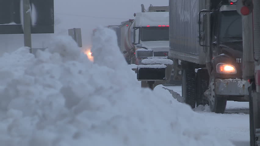 Trucks And Tractor Trailers Stranded In Blizzard Cold And Major Snow ...