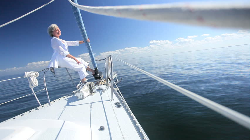 Healthy Mature Lady Having Fun Enjoying Life Aboard Her Luxury Sailing ...